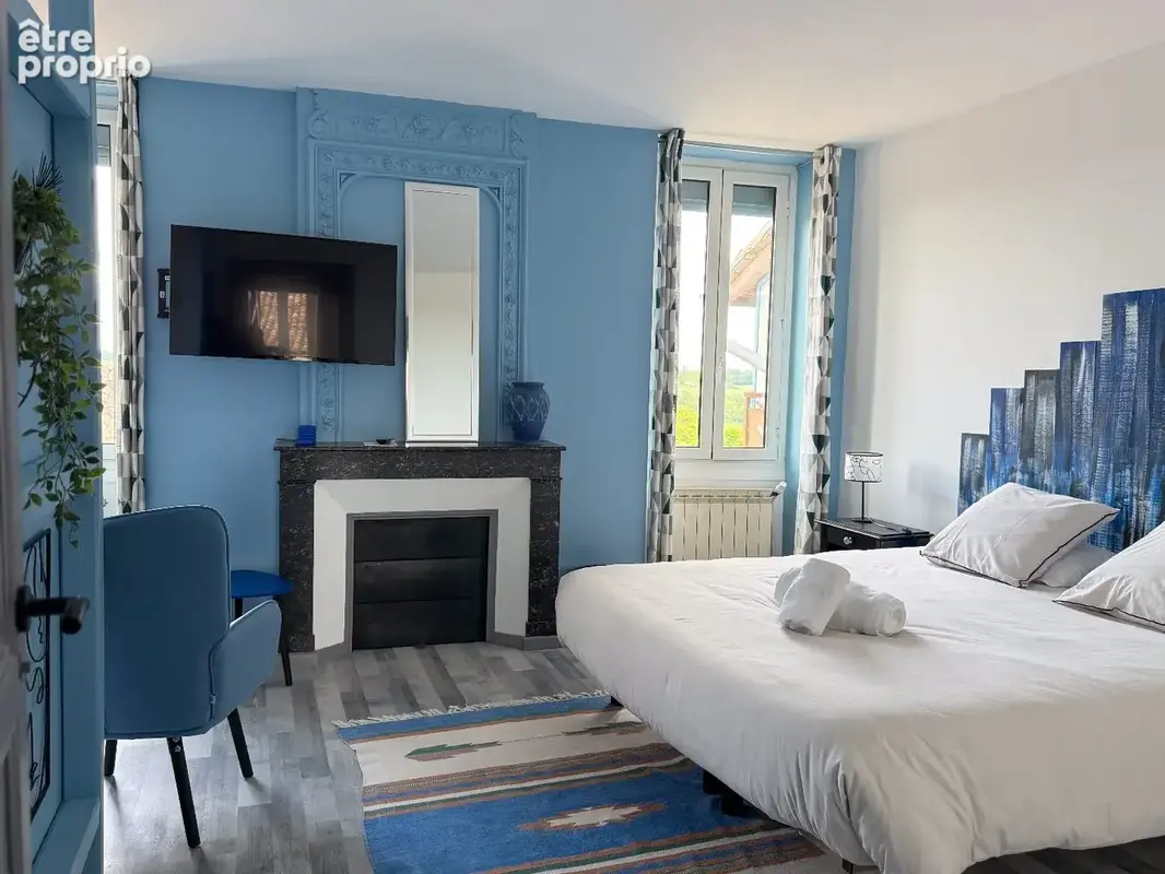 Une rénovation contemporaine pour deux maisons reliées par un patio et jardin avec piscine - photo 6