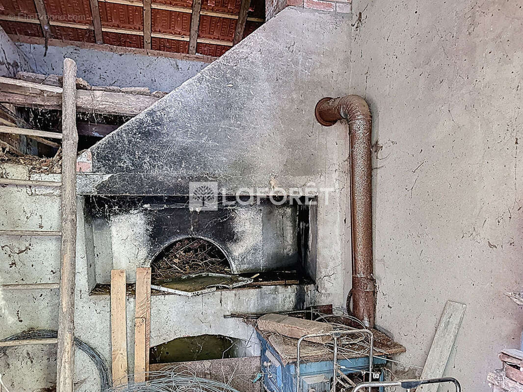 Maison à COURMANGOUX