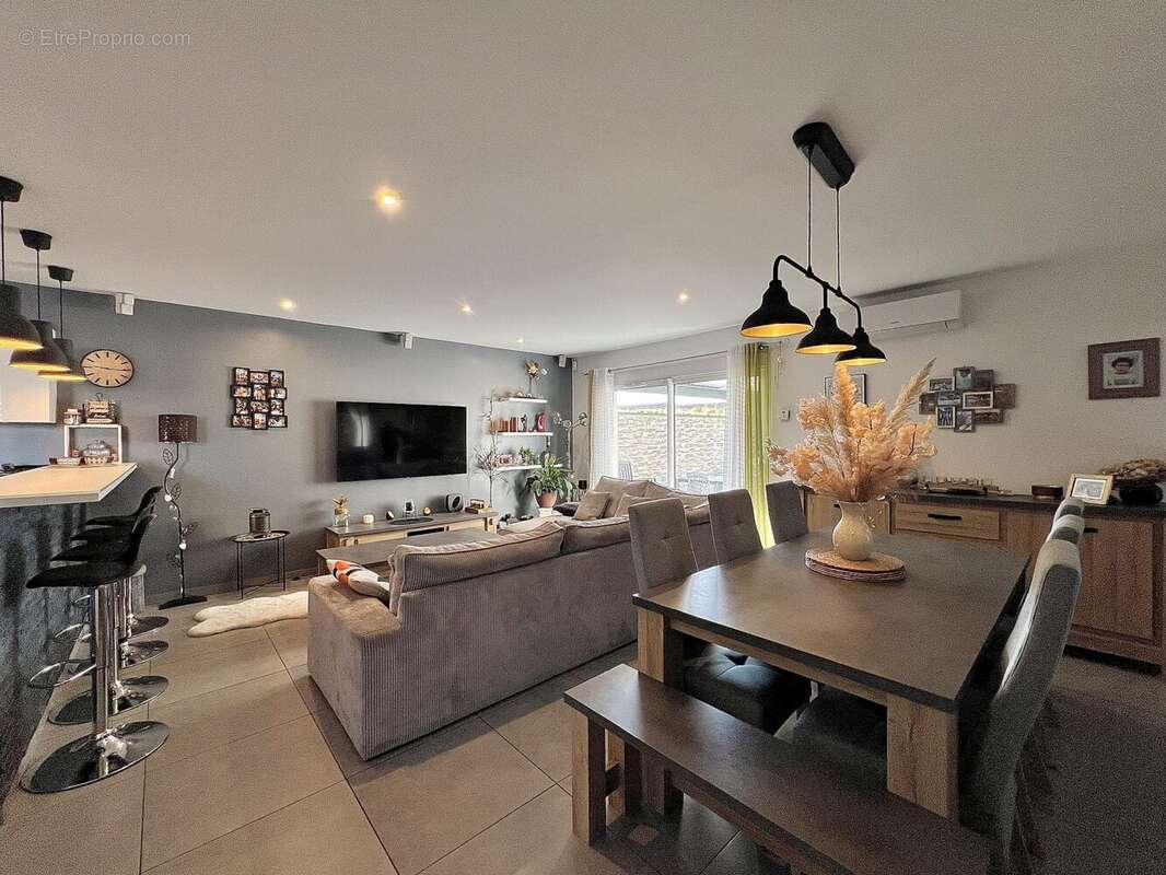 Maison 111 m² à Tignieu-Jameyzieu  - photo 3