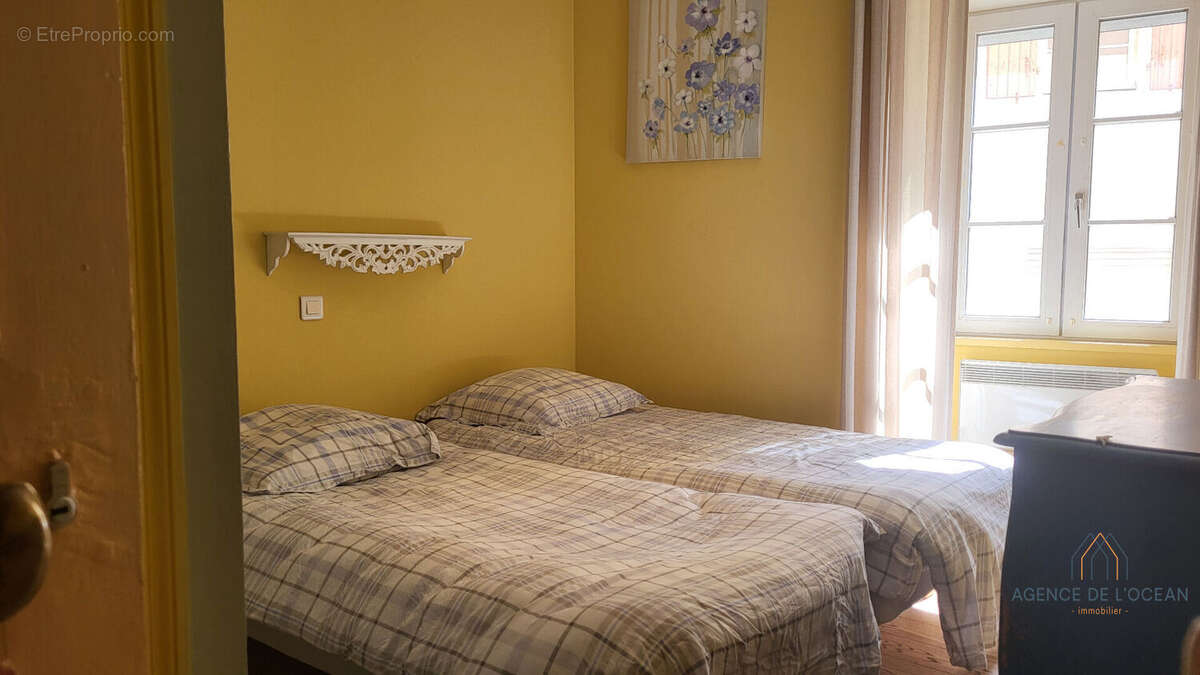 Appartement traversant à vendre à Le Palais - Lumière, vue et standing au coeur de Belle-Île-en-Mer - photo 11