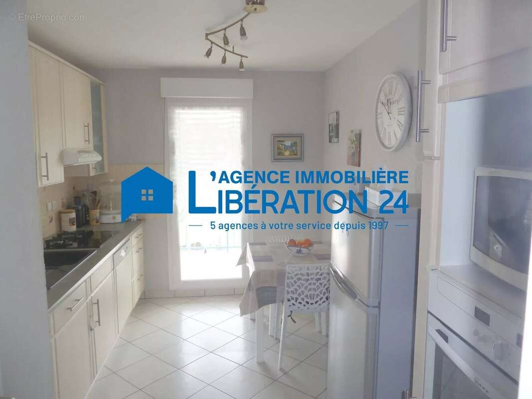 APPARTEMENT T2 56m²  Ascenseur +2terrasses+garage+parking+cave - photo 5