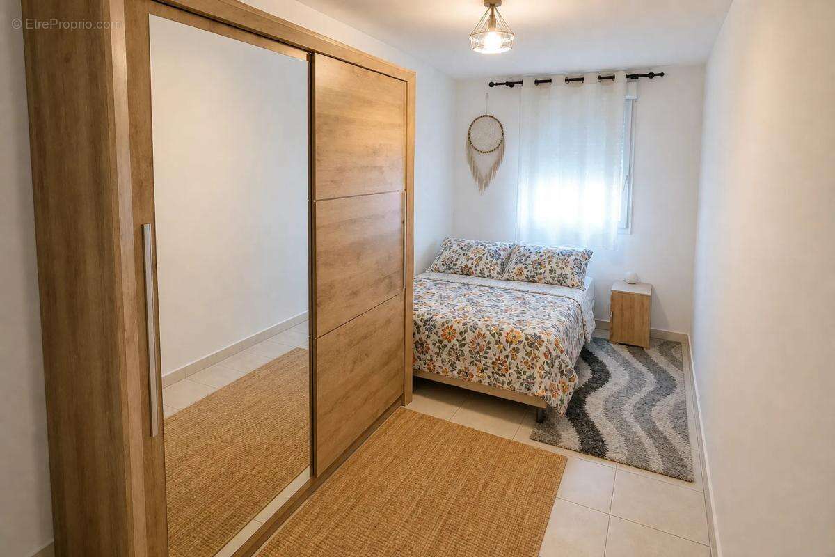 Appartement 3 pièces de 74m² avec terrasse et jardin privatif - photo 4