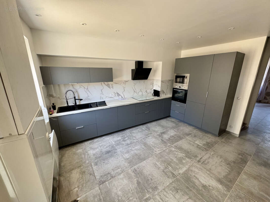 Maison rénové type 4 sur un terrain de 180 m2 - photo 3