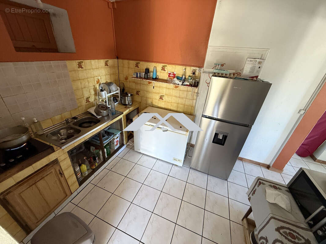 Maison 69 m² à Saint-Leu  - photo 5