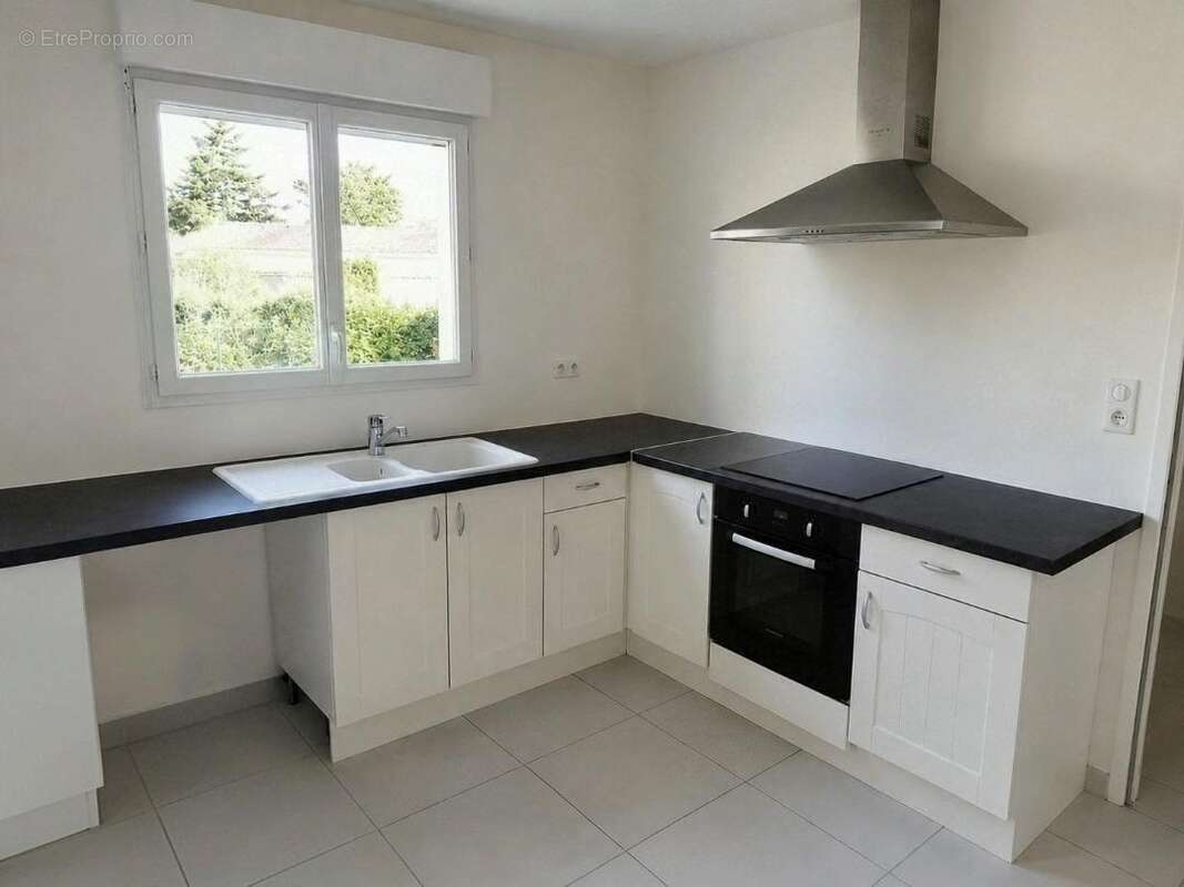 Maison 106 m² à Fontaine-Le-Comte  - photo 26