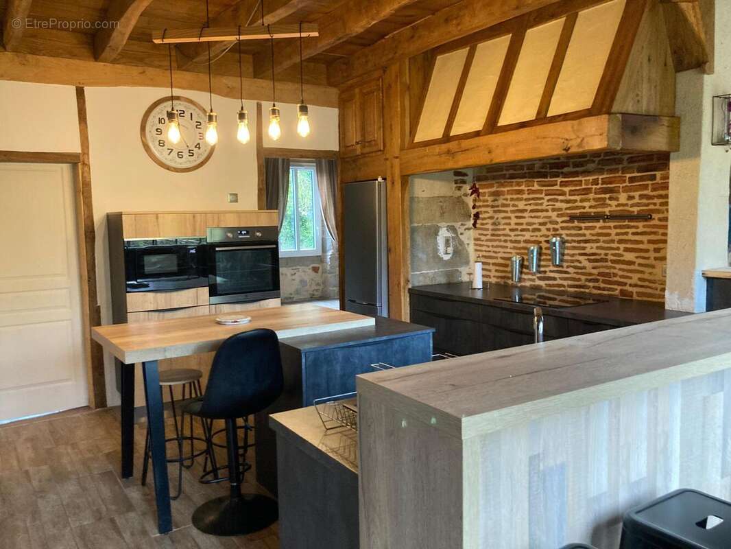 Photo 2 - Maison à PRUDHOMAT