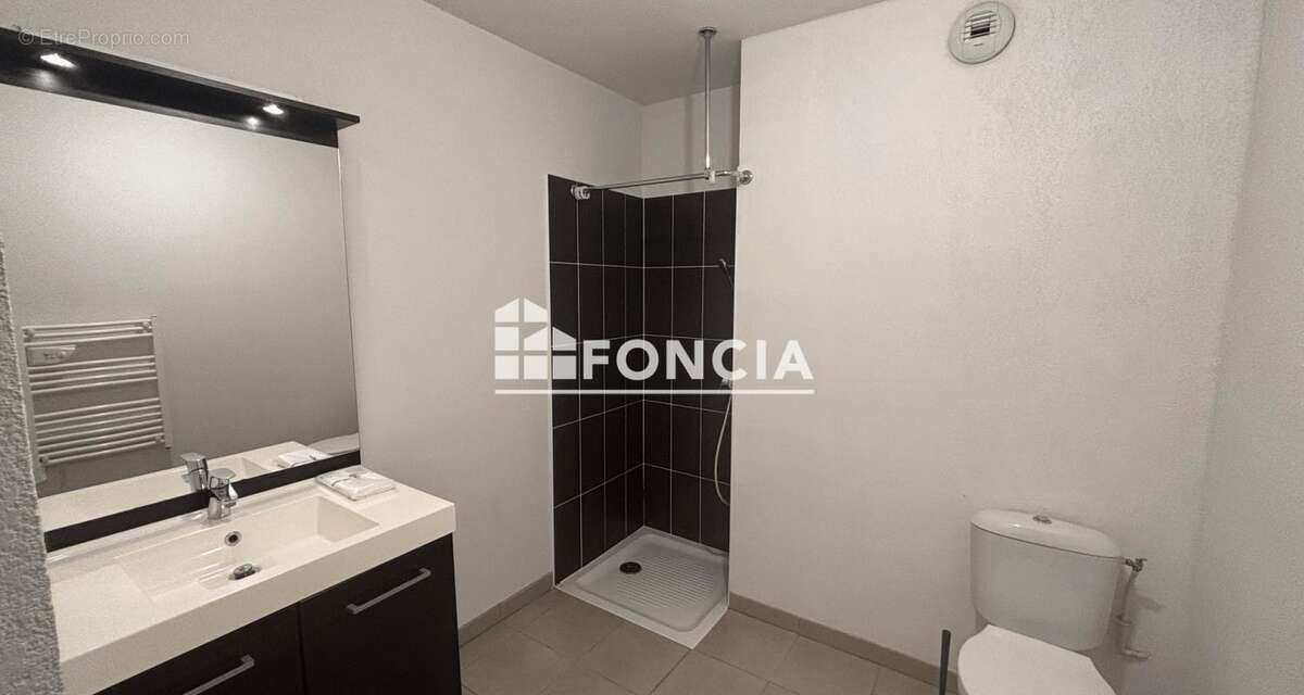 Grand T1 33m² vendu loué, idéal investisseur, DPE B avec parking en sous-sol - photo 4