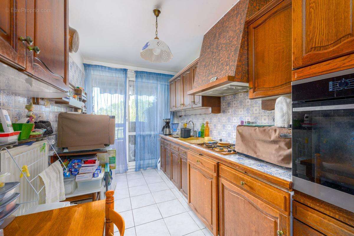 Appartement 5 pièces - 110 m² - balcon - boxes et parking sous-sol - photo 5