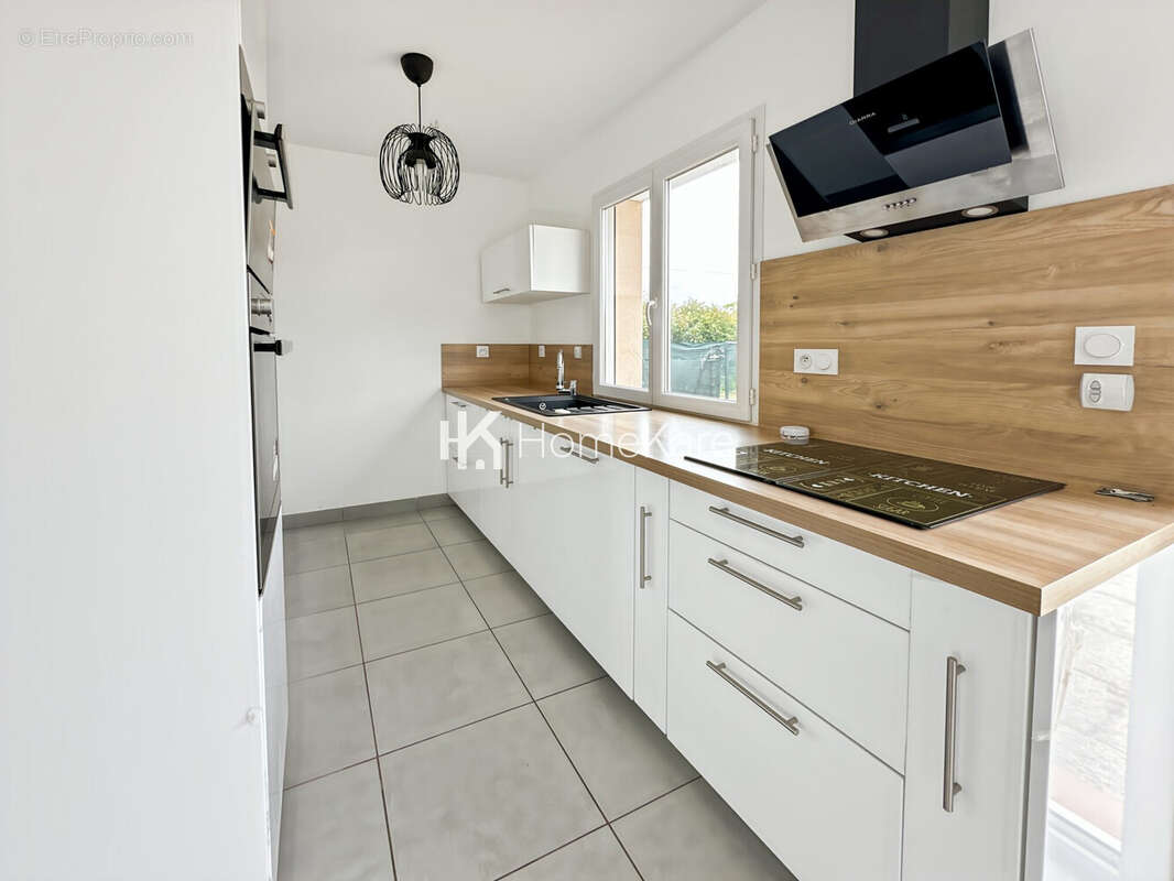 Maison 100 m² à Carbonne  - photo 5