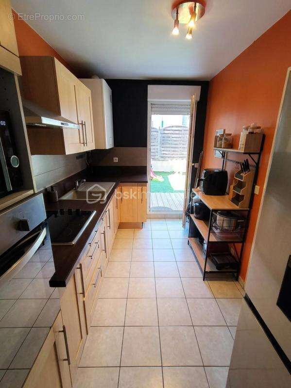 T3 de 67 m² avec jardin-terrasse de 38,5 m² plein sud, parking en sous-sol et résidence sécurisée – Investissement locatif (bail - photo 5