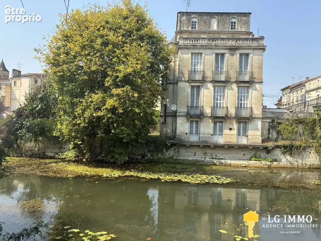 Rare, superbe batisse au coeur de jonzac avec jardin et garage - photo 14