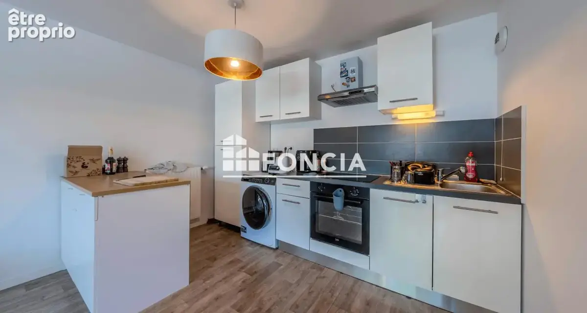 Appartement T2 avec parking privé en s/sol - photo 2
