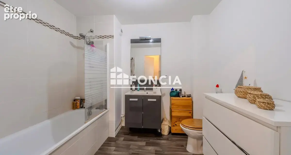 Appartement T2 avec parking privé en s/sol - photo 3