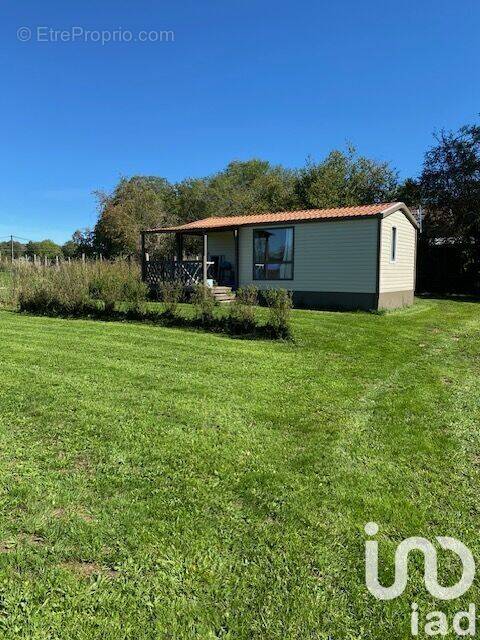 Photo 1 - Terrain à BROMONT-LAMOTHE