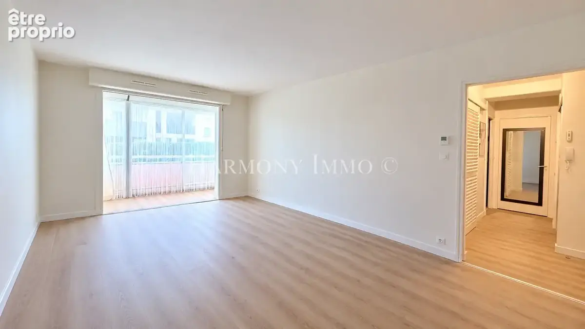 Appartement T2 de 55.43m2 en bon état, proche commerces. - photo 1