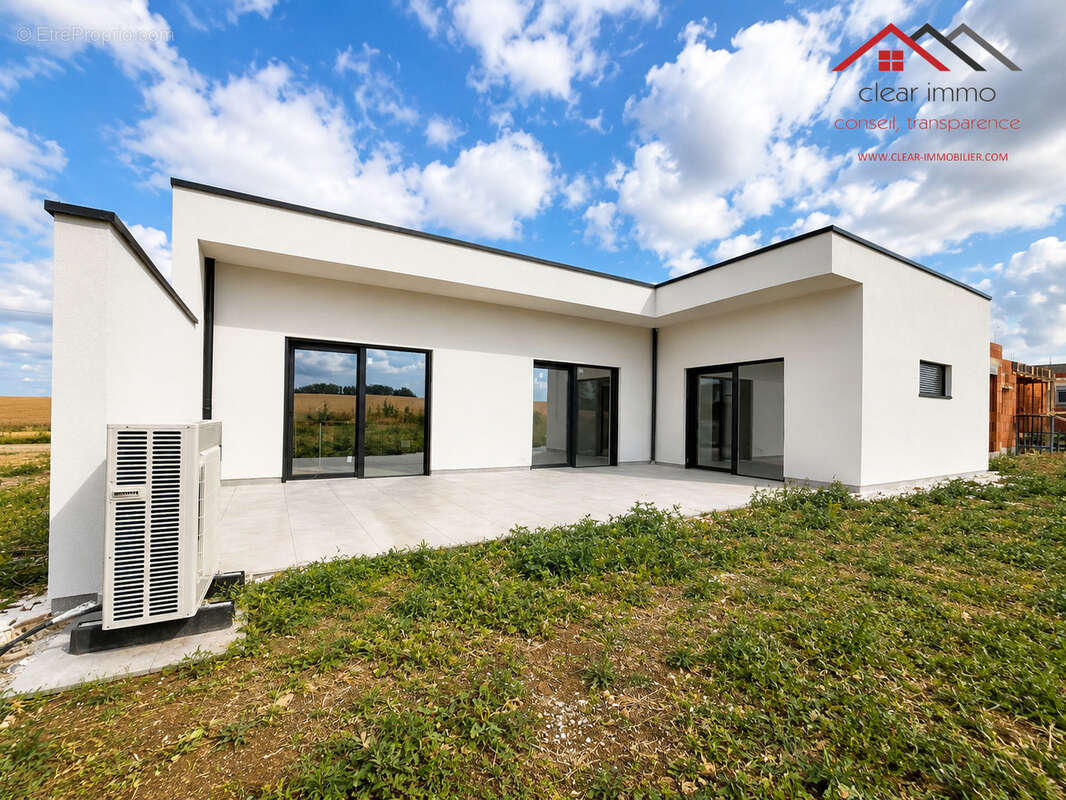 OGY-MONTOY-FLANVILLE - Maison 6 pièces 163 m2 habitables - photo 2