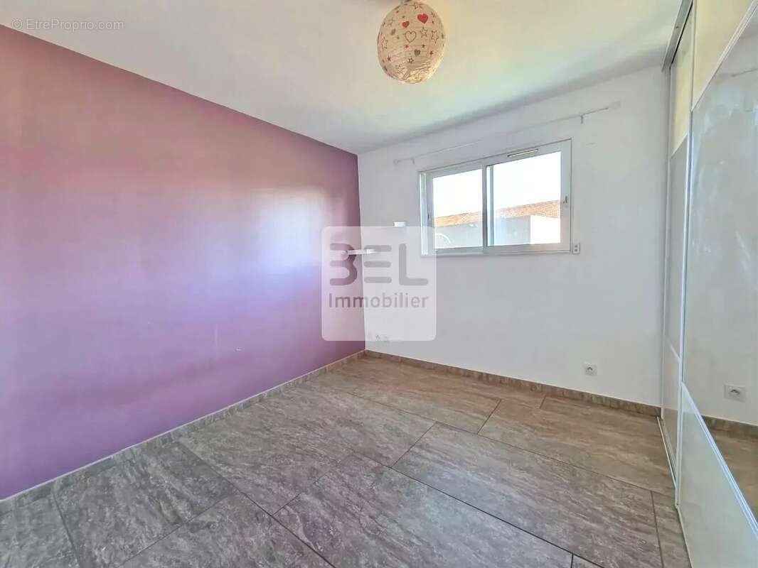 Maison à LAUDUN-L'ARDOISE