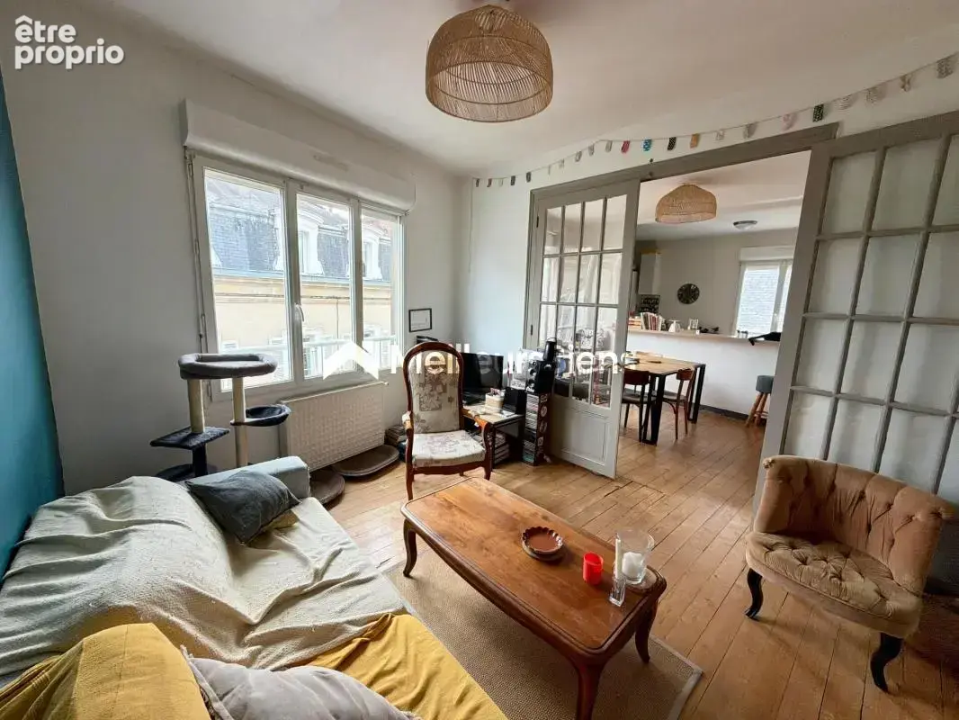 Laval – Secteur gare – Appartement de charme d’environ 80 m² avec 2 chambres et cave - photo 8