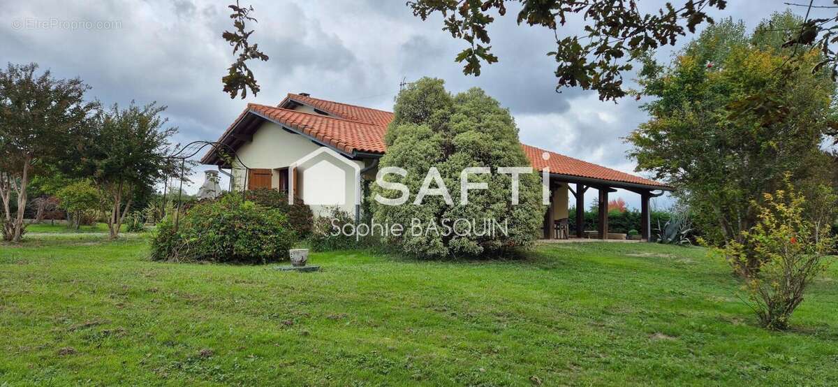 Photo 2 - Maison à SAINT-ETIENNE-D'ORTHE