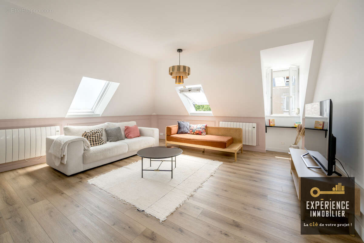 Appartement T3 rénové proche du bourg - photo 5
