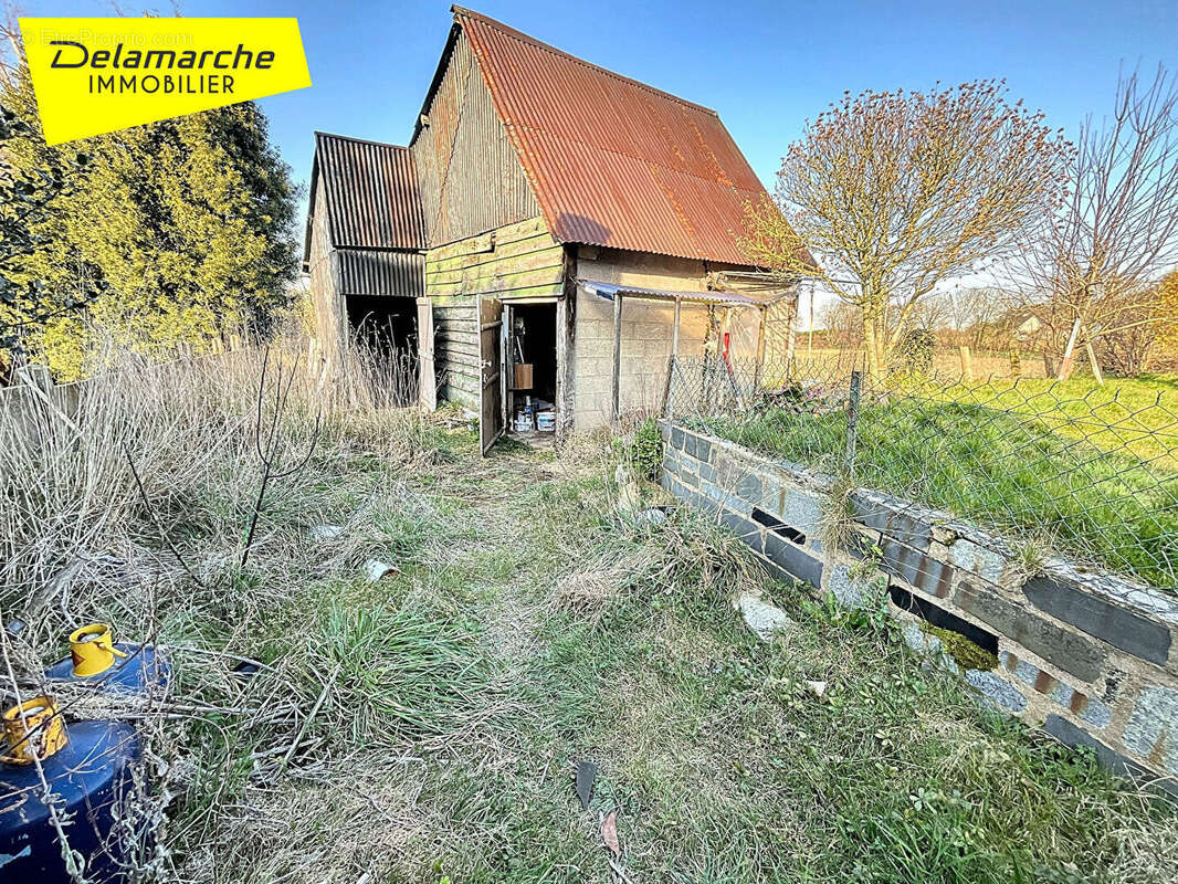 Maison à SAINT-AUBIN-DE-TERREGATTE