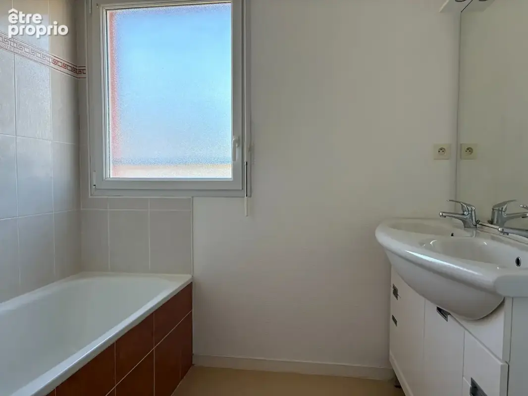 Appartement T4 de 83 m² avec balcon, garage double et cave - photo 12