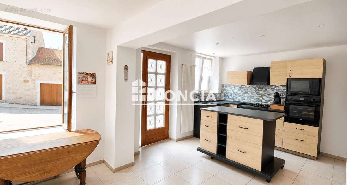 Maison ancienne avec garage, terrasse et beau potentiel d’évolution – Secteur Coincy - photo 2
