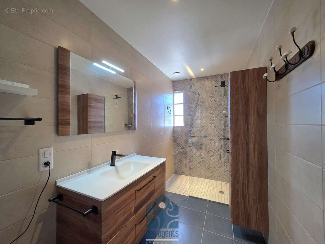 Maison individuelle 7 pièces avec terrasses, garages, caves et jardin - photo 9