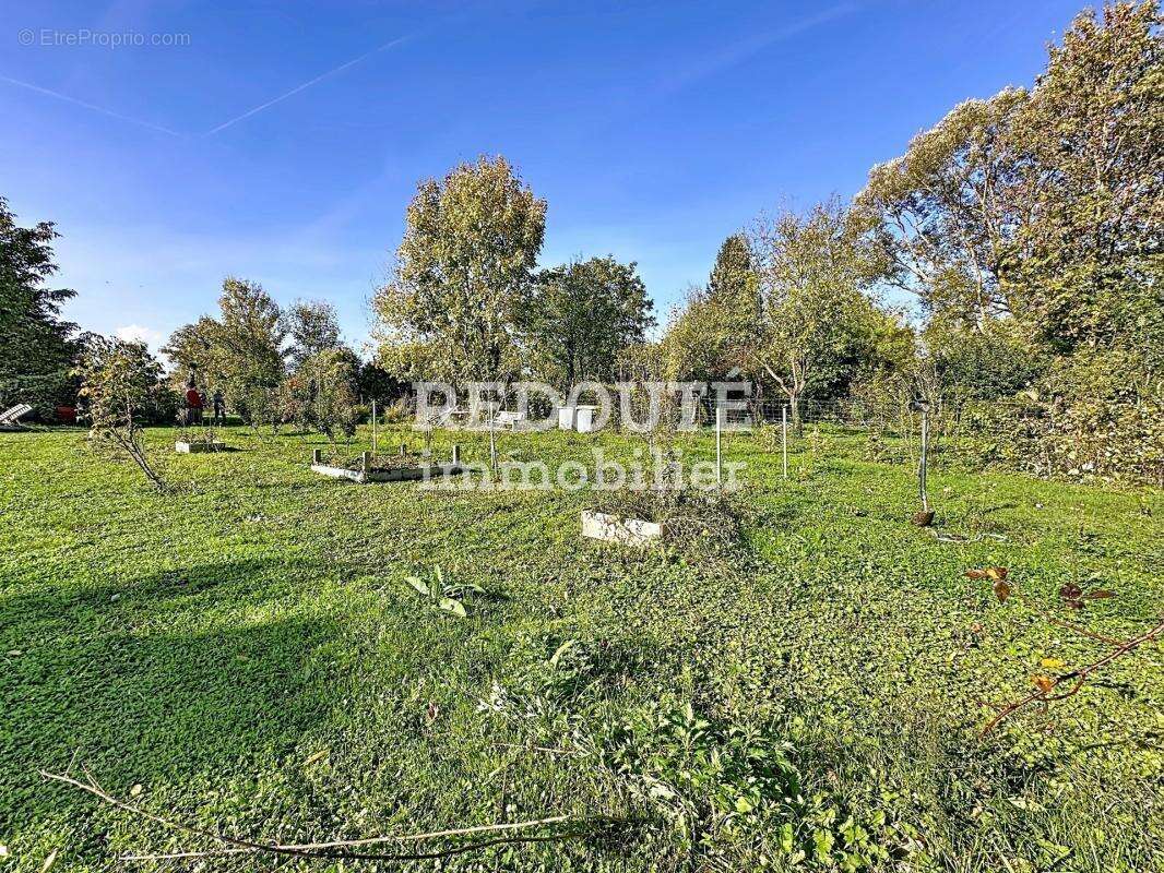 Maison à AGUILCOURT