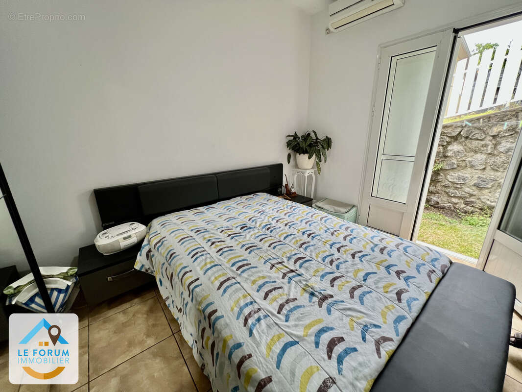 Saint pierre 97410 - villa f4 saine et fonctionnelle - beaux volumes - a etage - commodites a proximite - photo 10