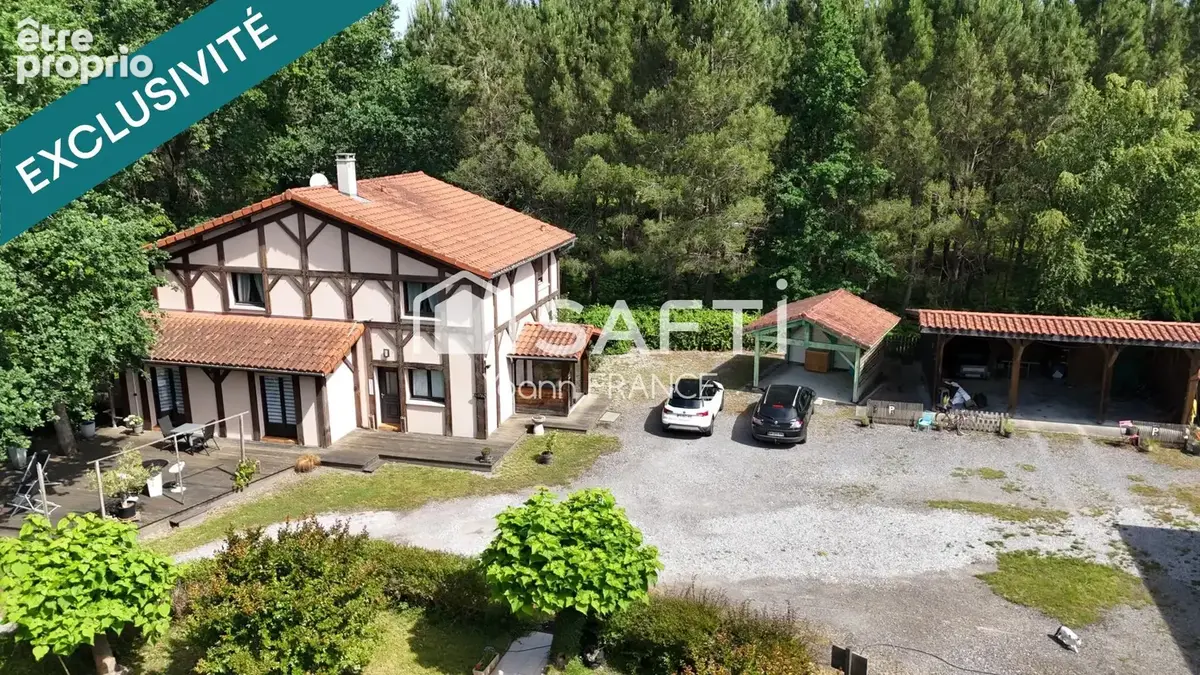 Photo 1 - Maison à SAINT-JULIEN-EN-BORN
