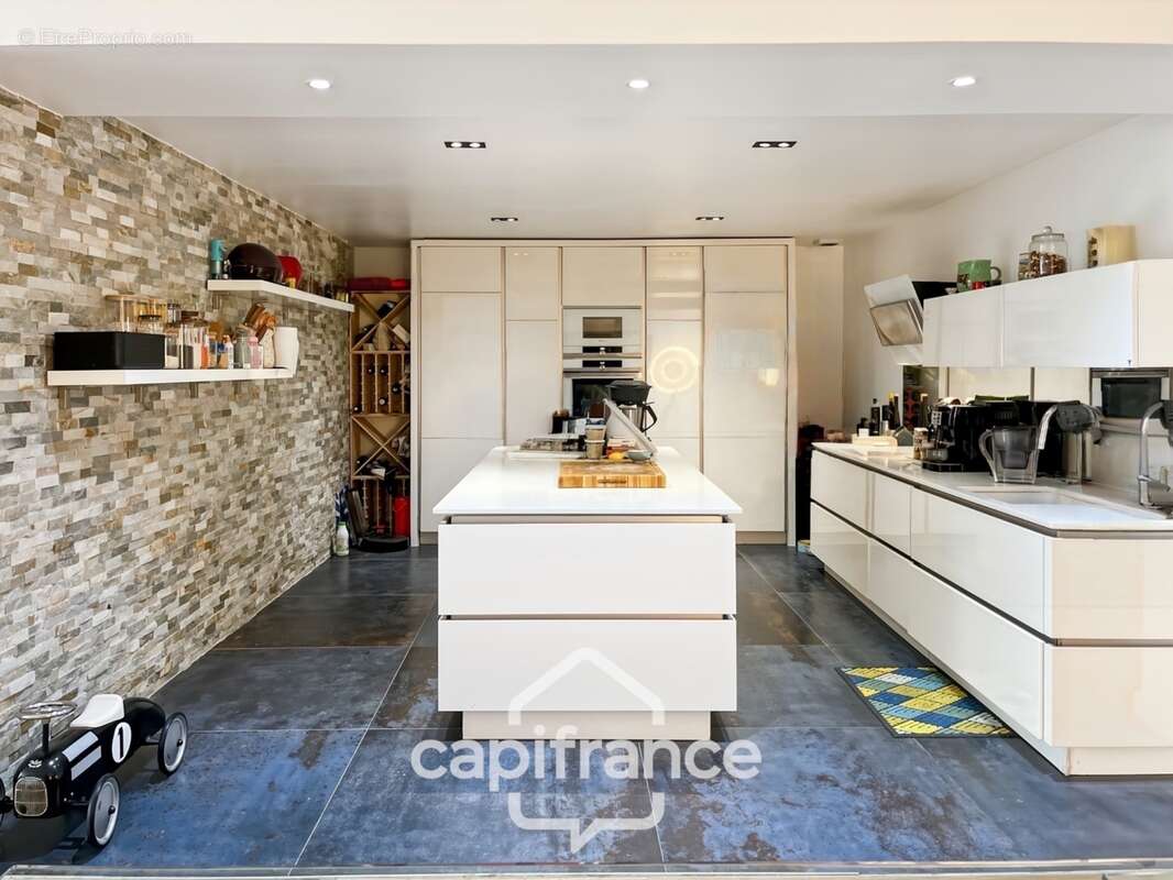 Appartement esprit maison – 164 m² – cour intérieure + box 1 voiture – rue Manessier – Nogent-sur-Marne - photo 7