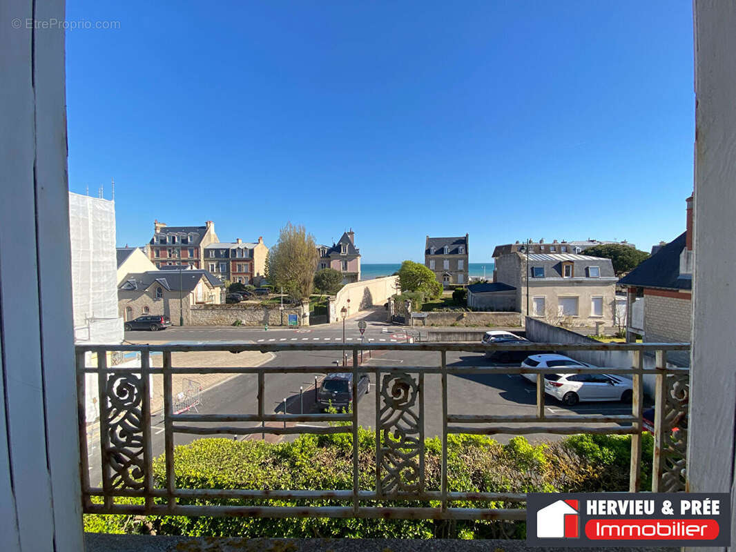 Appartement à vendre à Saint-Aubin-sur-Mer, cave, à 50 mètres de la plage, vue dégagée et proche des commodités - photo 2
