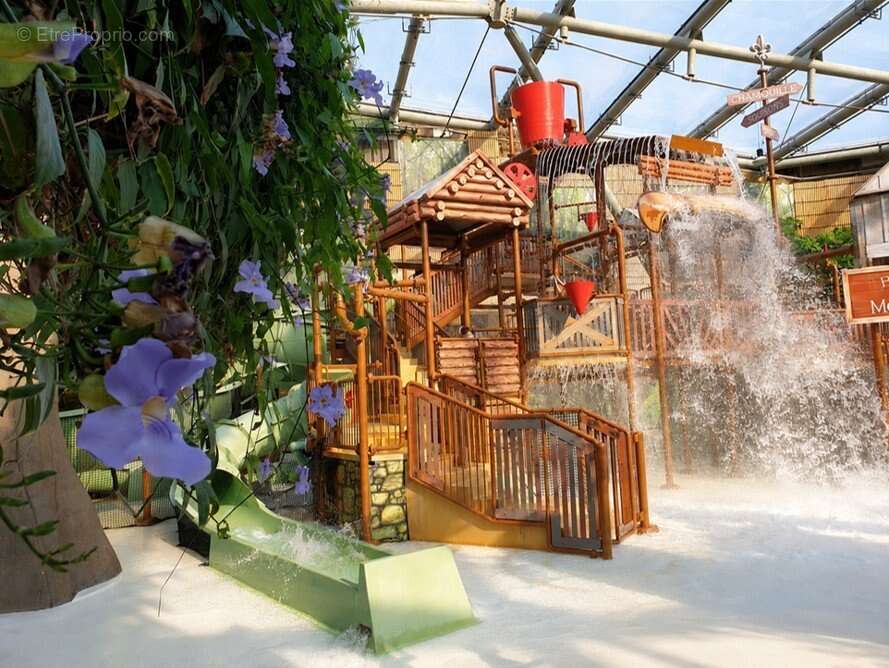 INVESTISSEMENT LOCATIF  CHAMOUILLE  Résidence de tourisme Center Parcs Le Lac d'Ailette - 7 % de rentabilité - photo 12