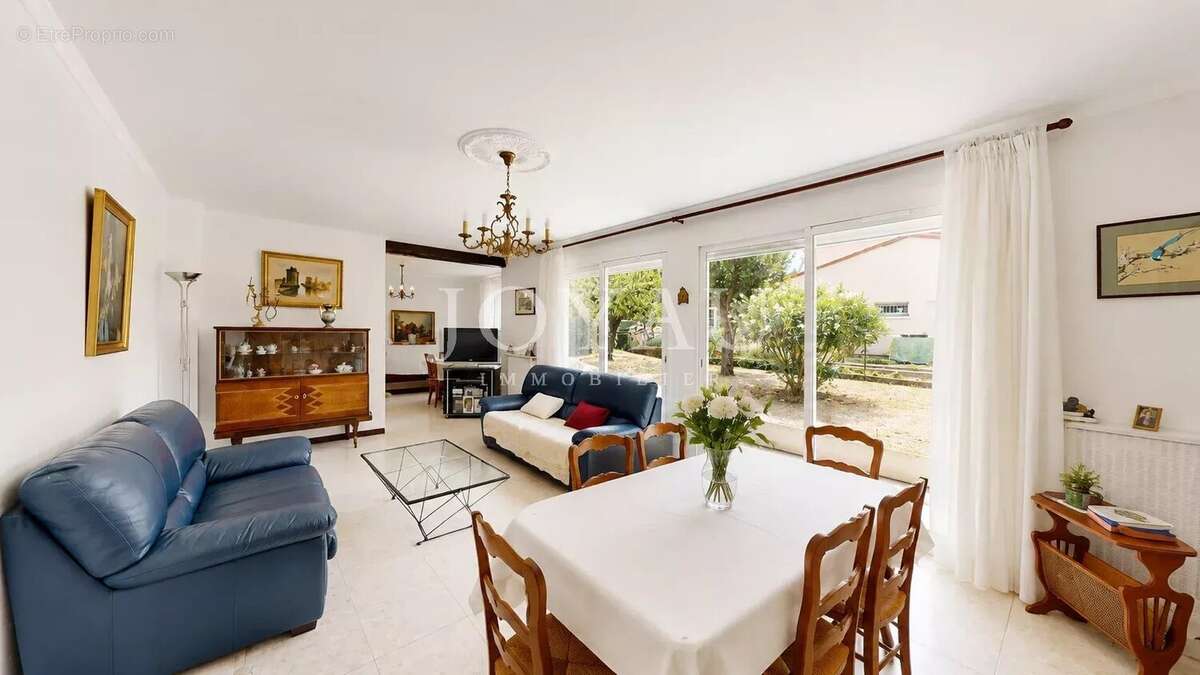 Maison familiale de 115 m² avec jardin, garage et fort potentiel - L'Union - photo 3