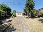 FACADE ARRIERE - Maison à MAUROUX