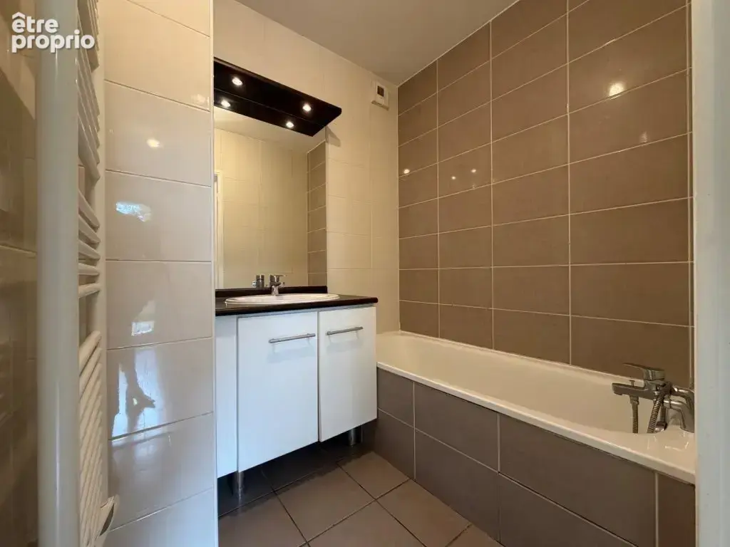 EXCLUSIVITÉ - TASSIN - 134, rue Joliot Curie, T2 en rez-de-jardin - photo 8
