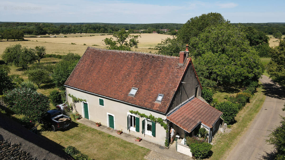 Maison à MENOU