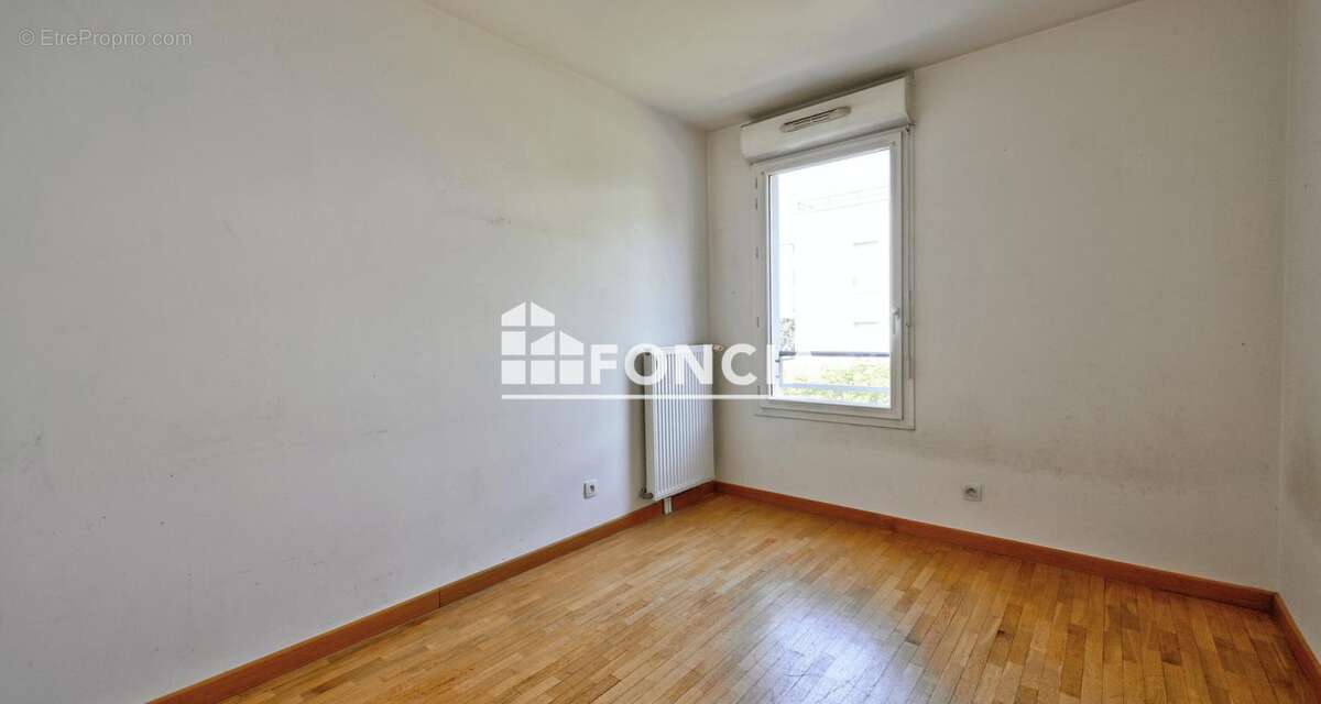 Appartement familial de 4 pièces (3 chambres) avec une place de parking, proche des écoles, des commerces et des transports - photo 6