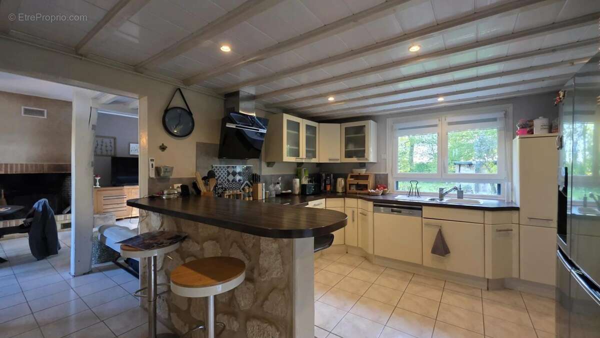 Maison à LUCHY