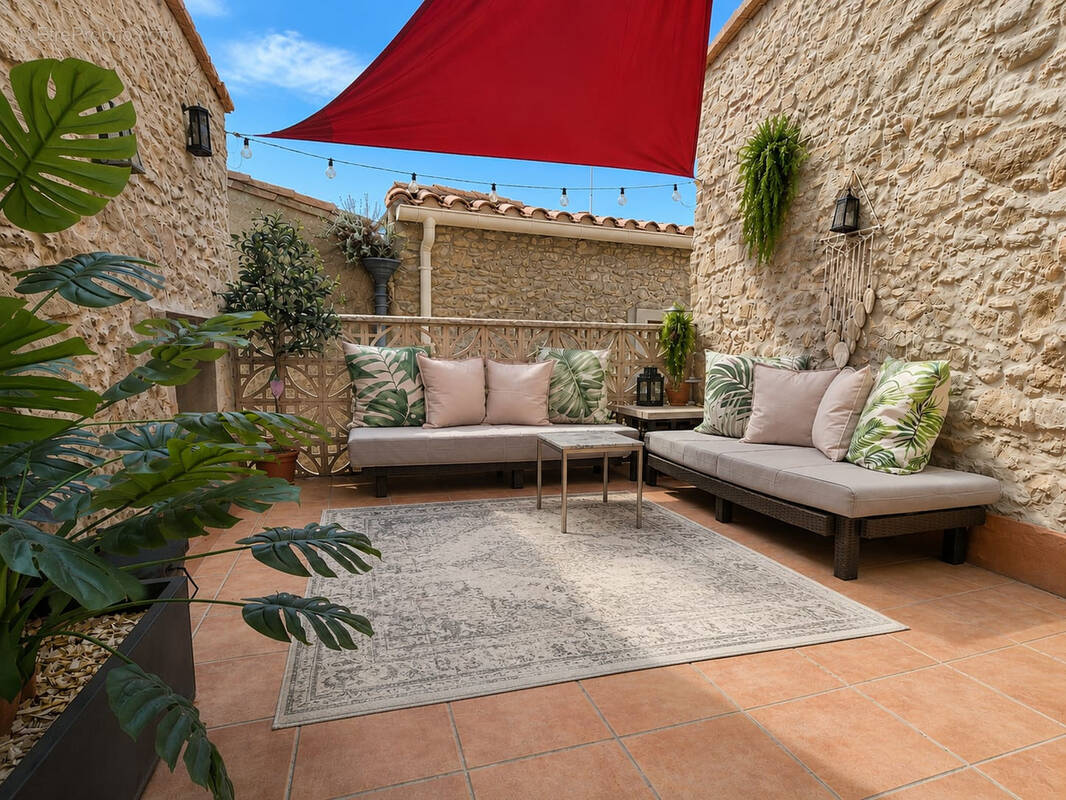2 maisons reliées par une terrasse - photo 1