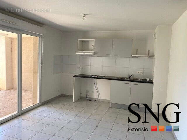 Appartement à GARONS