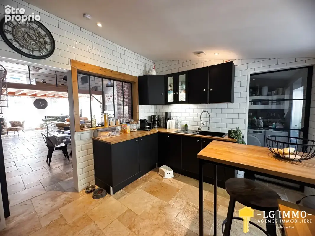 Maison de plain-pied avec jardin et garage en centre ville - photo 3