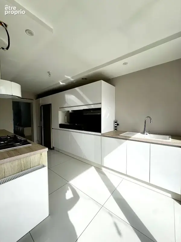 Maison contemporaine spacieuse à vendre à Louvroil - 11 pièces, grand terrain, calme assuré - photo 4