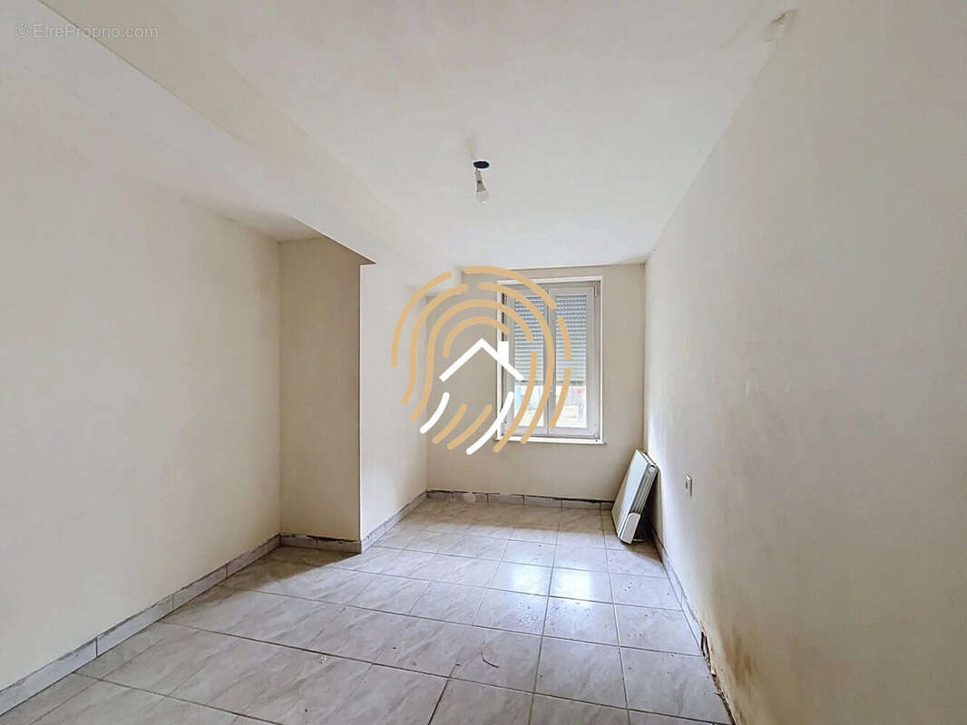 Maison 56 m² à Raimbeaucourt  - photo 7
