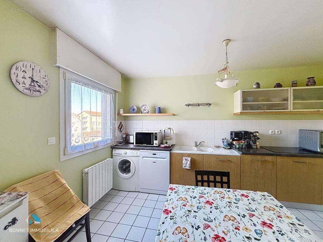 Grand T2 de 61 m² avec terrasse, garage et ascenseur – Loué jusqu'en 2027 - photo 4