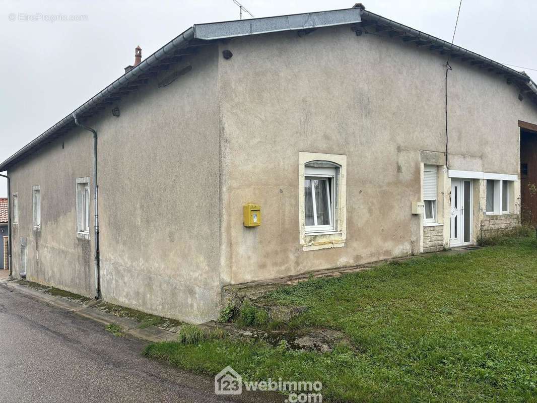 Maison à COUROUVRE