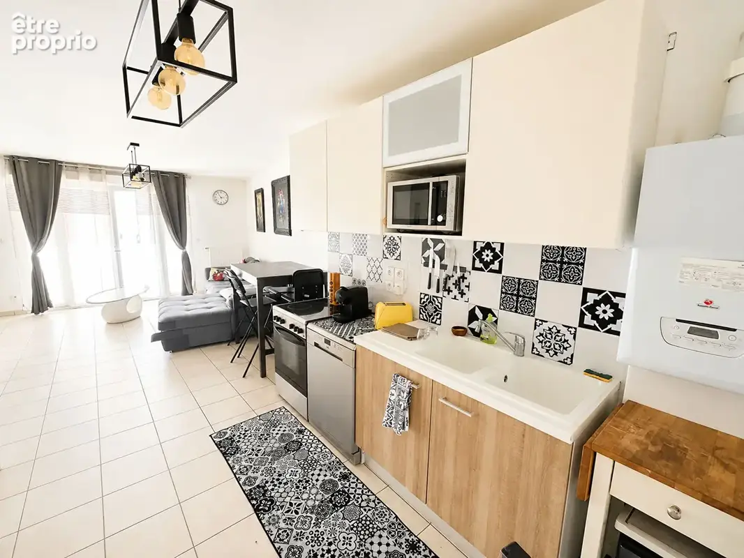 VILLEURBANNE - T3 de 68,24 m² avec balcon et garage - photo 3