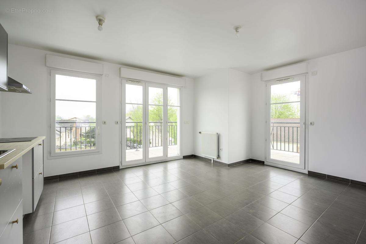 Appartement 3 pièces 57.71 m² - Balcon SUD-OUEST - Parking sous-sol - photo 2
