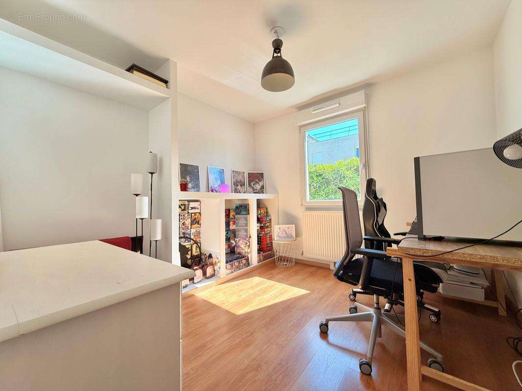 Appartement T3 avec jardin privatif et place de stationnement - photo 11